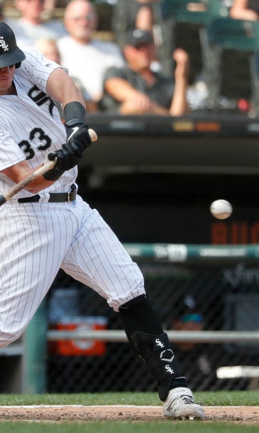 McCann grand slam in 8th powers White Sox past Astros 13-9